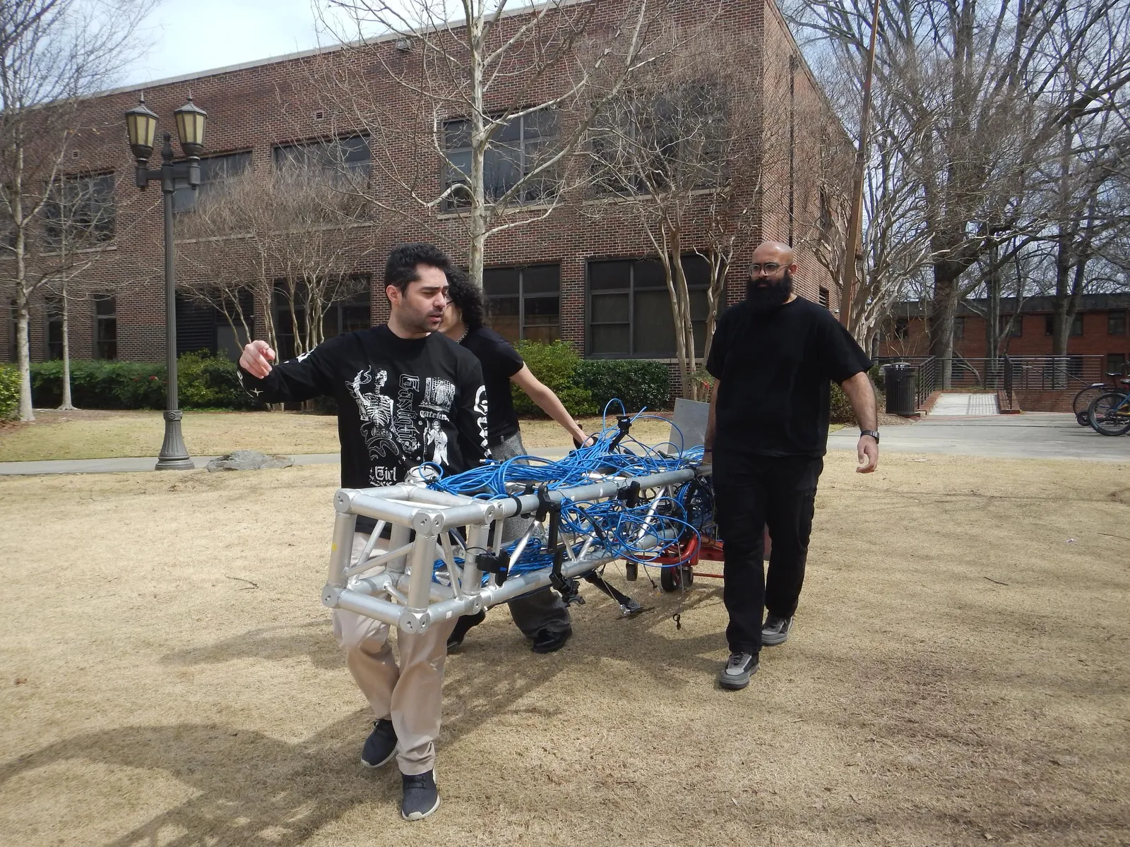 Surveil, carrying the truss to the venue